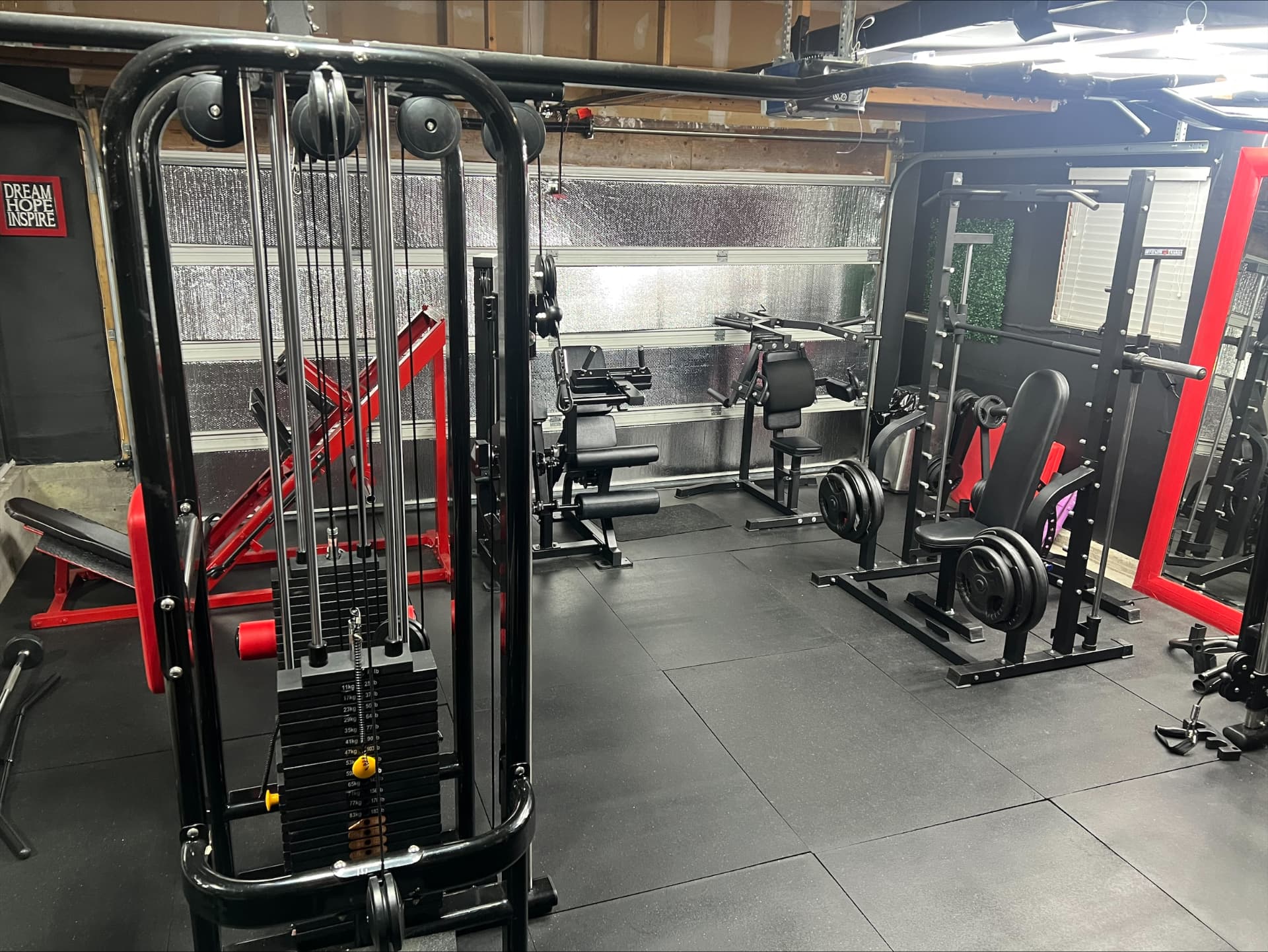 Cable and plate-loaded machines set up for joint-friendly training